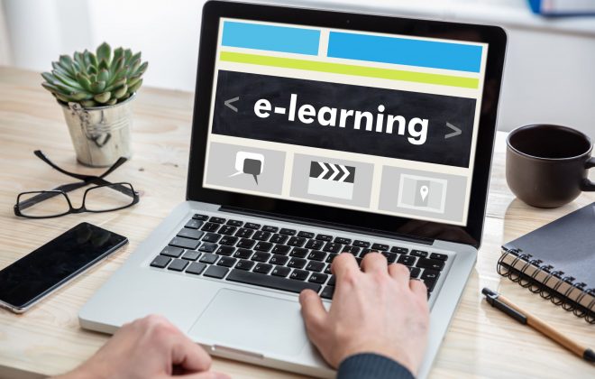 computer that has the word e-learning on the screen